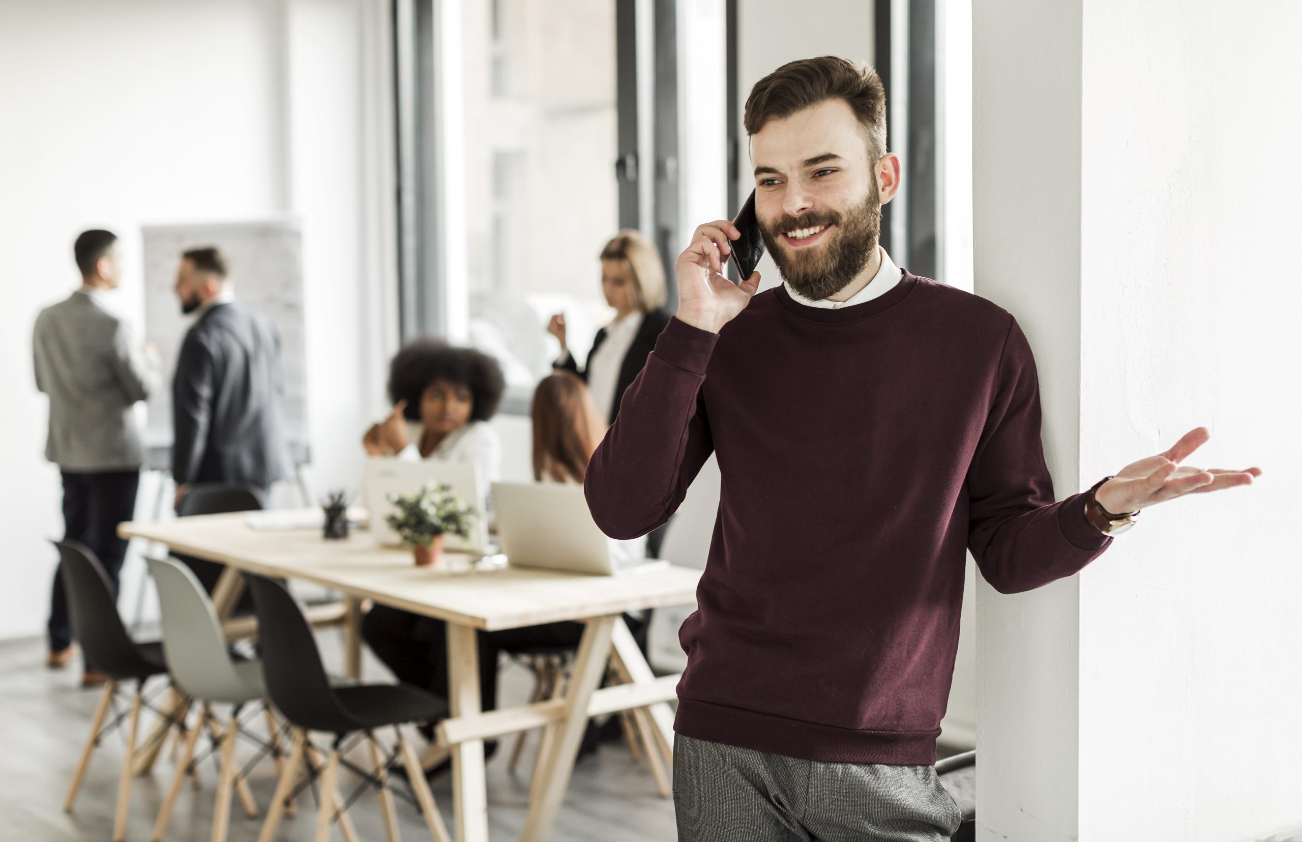 front-view-man-talking-phone-1-scaled Home